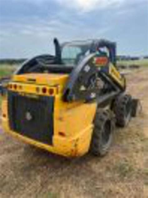 which battery for c228 new holland skid steer|new holland l228 weight capacity.